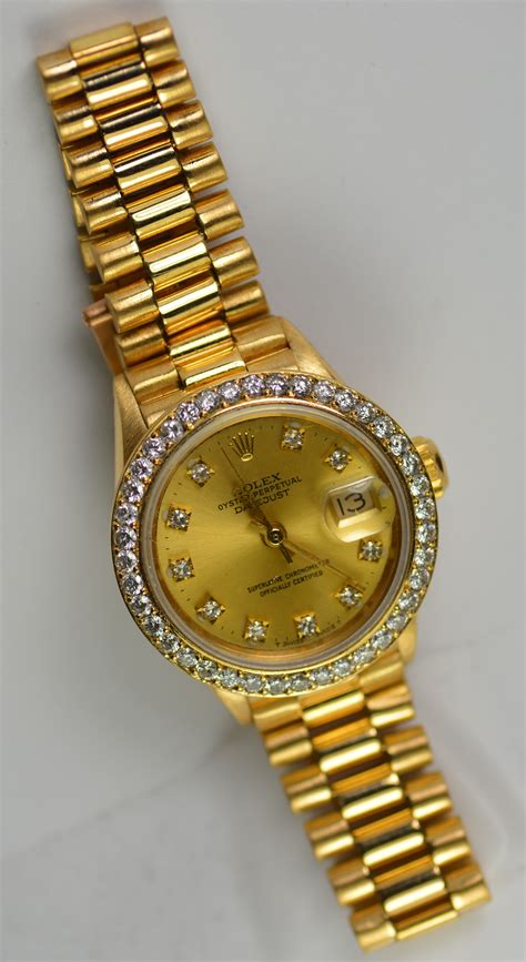 ladies gold rolex watch with diamond bezel|rolex lady datejust 18k gold.